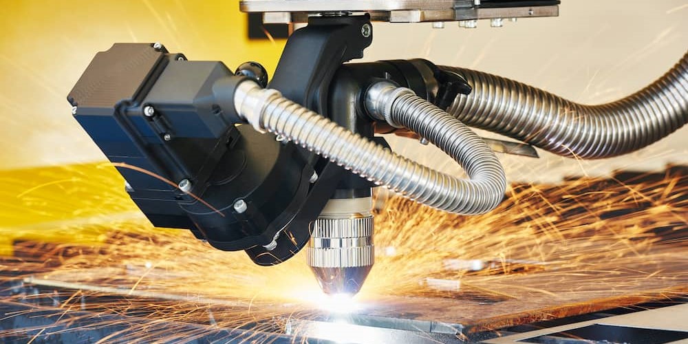 laser cutting machine with sparks flying in every direction