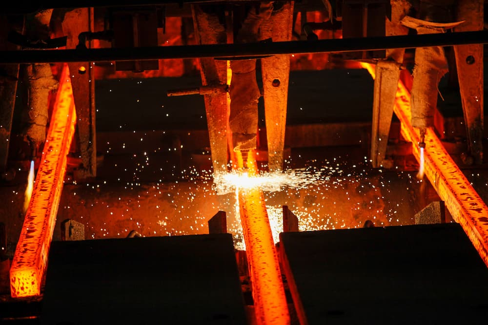 Torch cutting steel produced by continuous casting into billets.