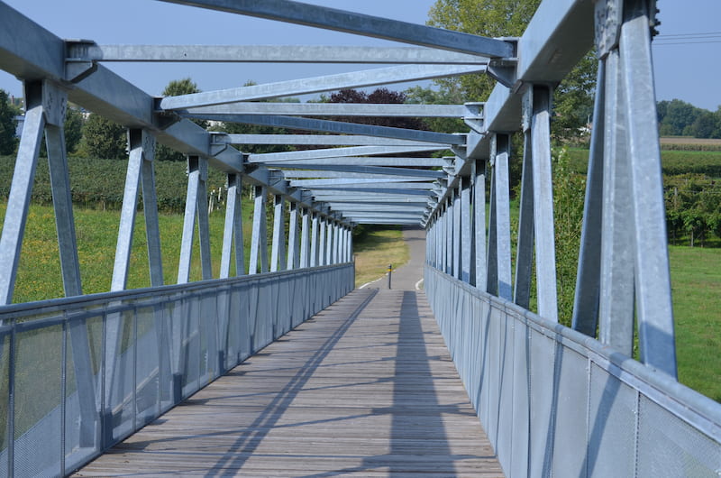 Bicycle and pedestrian bridge made from galvanized steel and wood