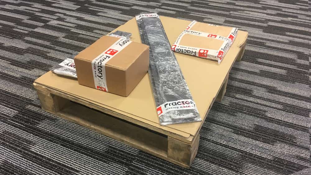 packaged metal parts on a pallet