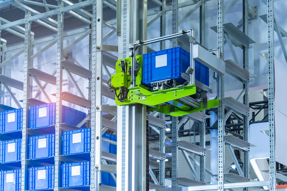 Plastic boxes in the cells of an automated warehouse.